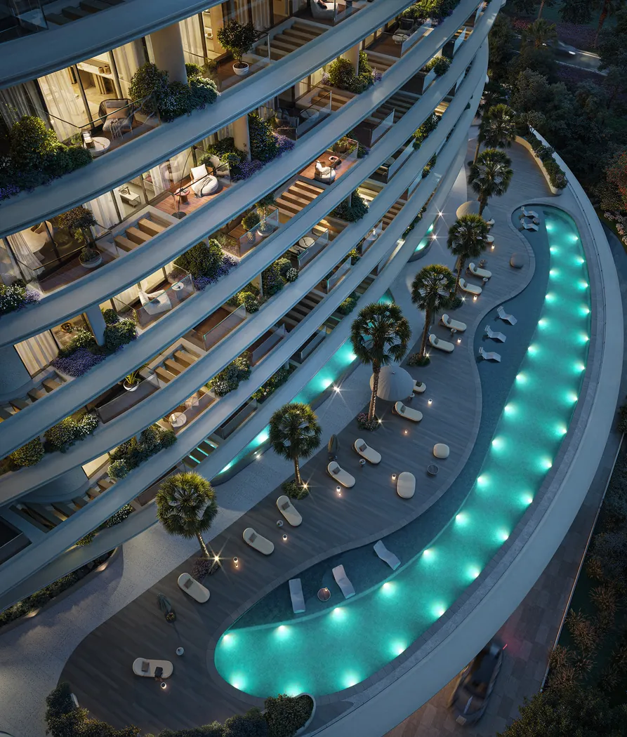 Aerial night render of the illuminated podium pool at Lia Residence